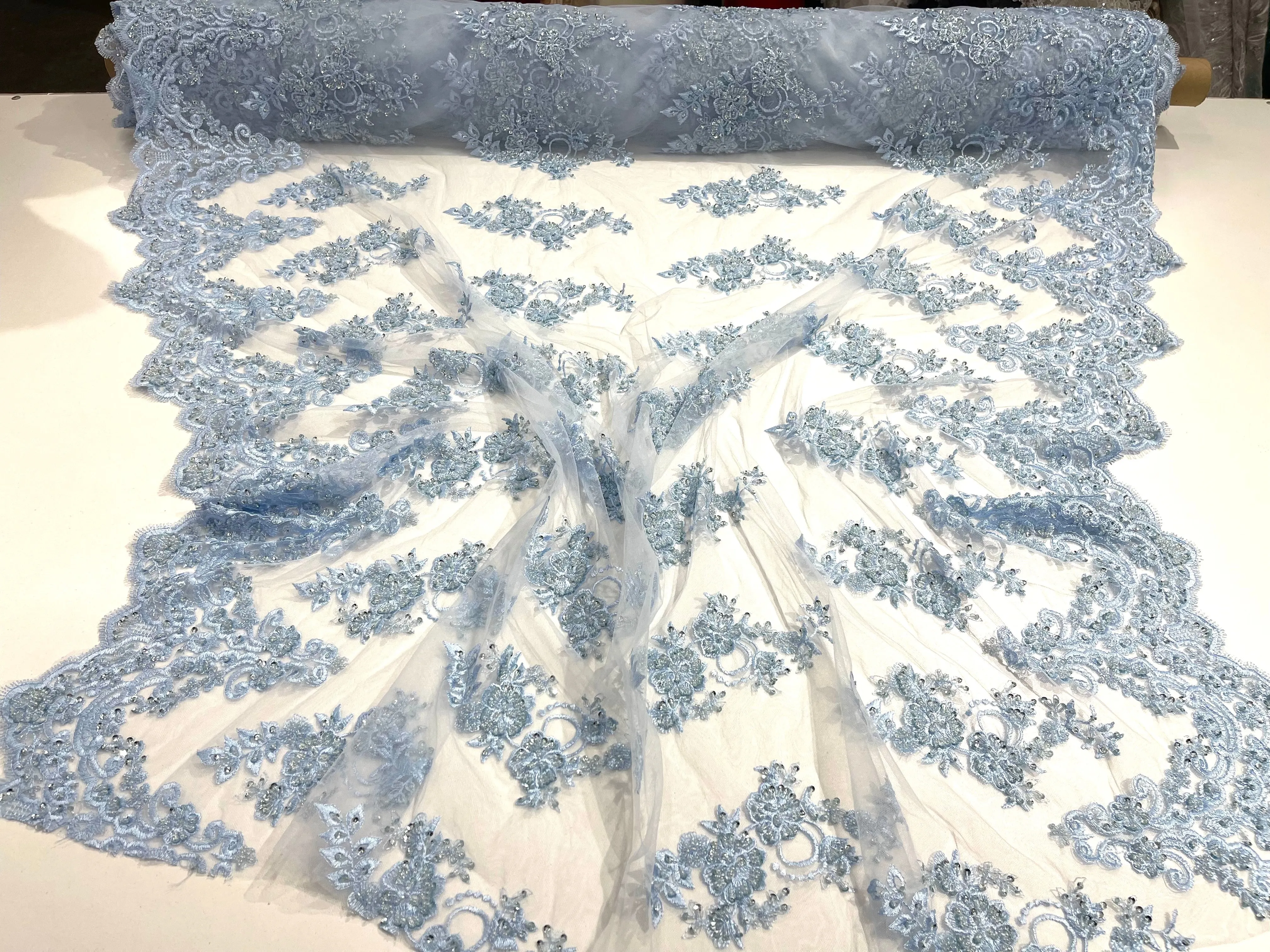 Light Blue elegant hand beaded flower design embroider on a mesh lace-prom-sold by the yard.