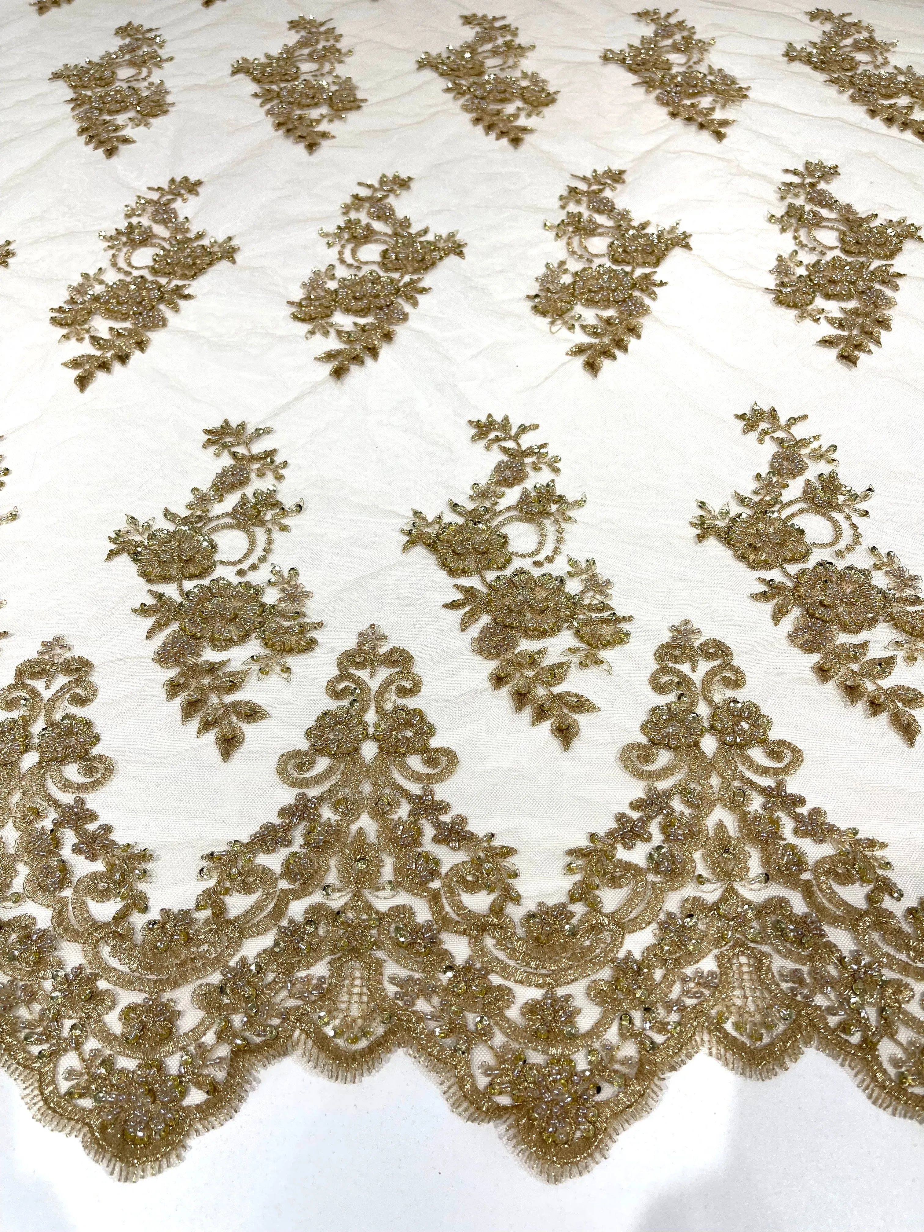 Metallic Gold elegant hand beaded flower design embroider on a mesh lace-prom-sold by the yard.